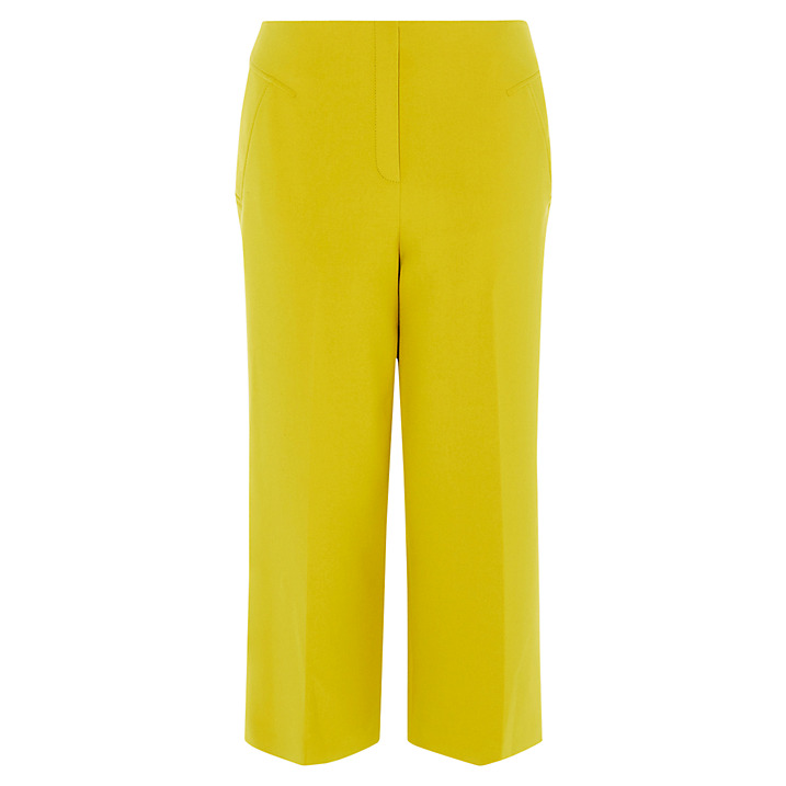 yellow cropped trousers